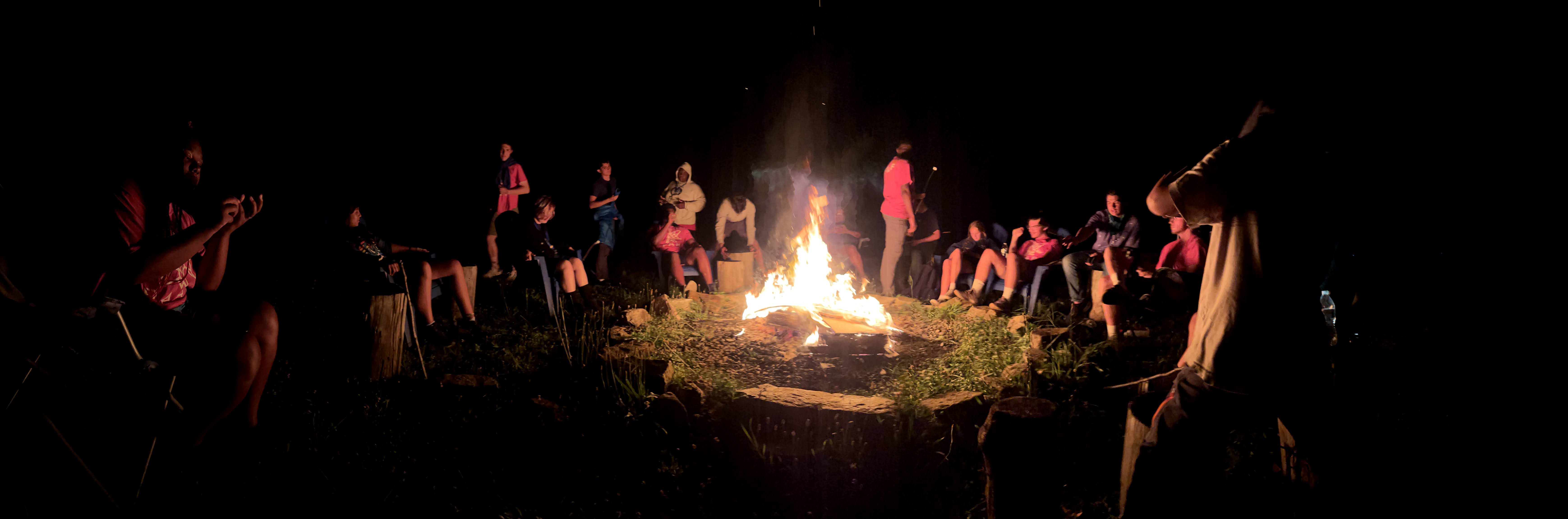 campers around the campfire